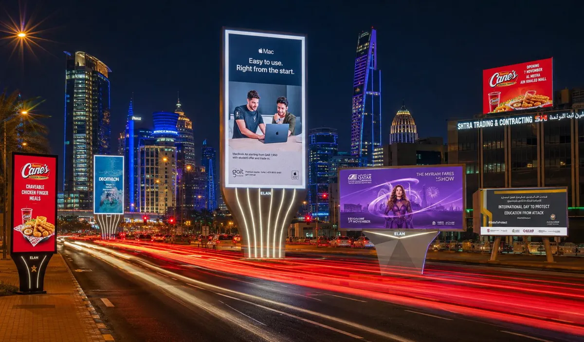 ELAN roadside DOOH screens along a Doha corridor with the city skyline
