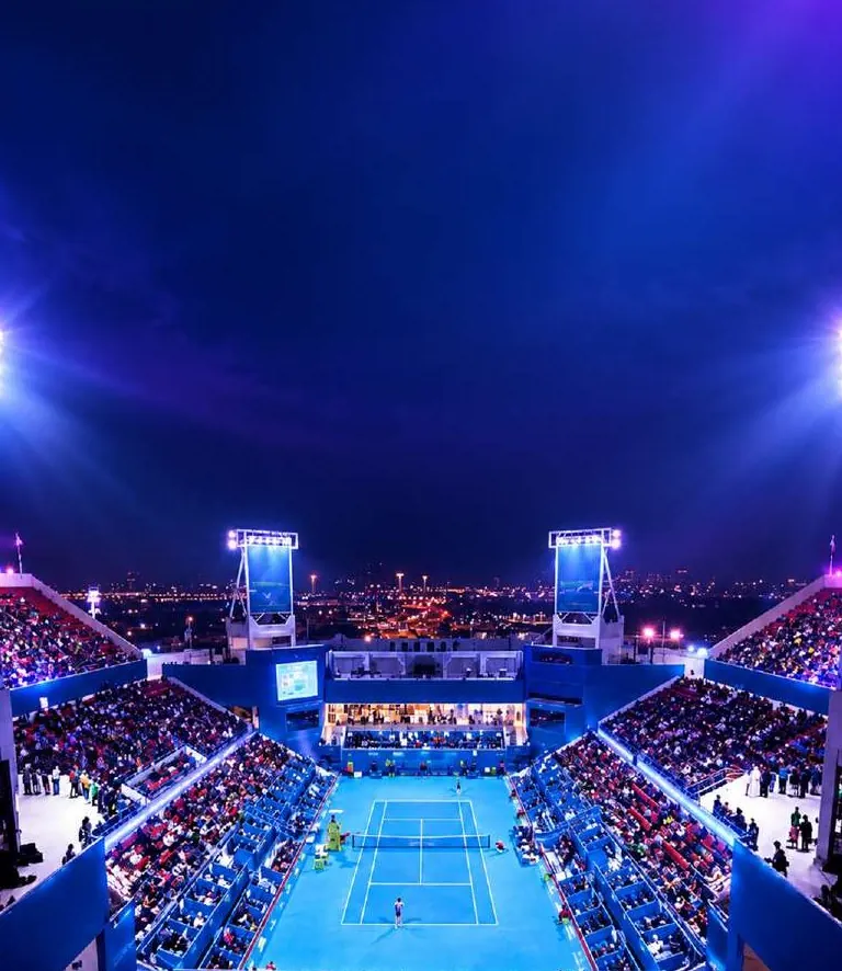 Tennis stadium court at night